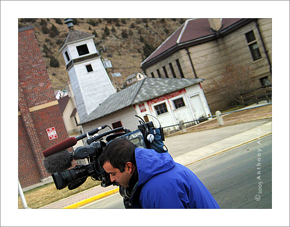 cameraman in front of firehouse